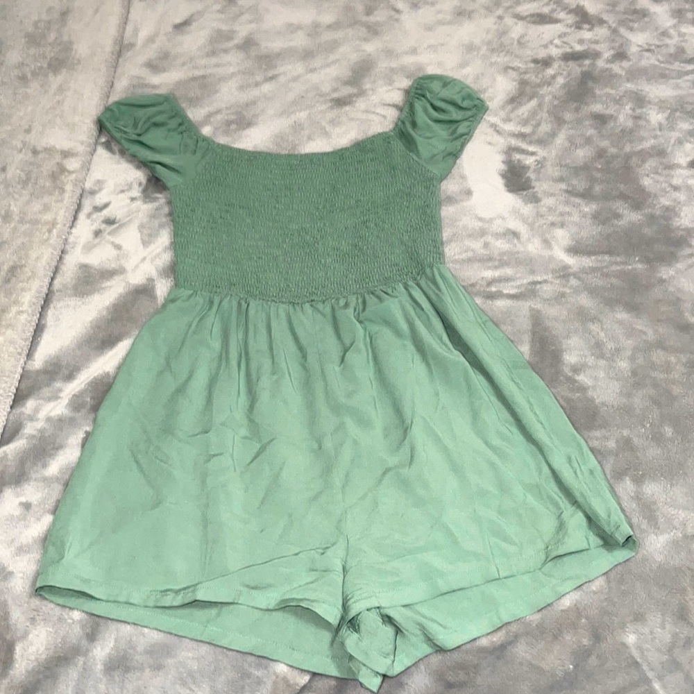 Light green romper (can be worn off the shoulder or not)